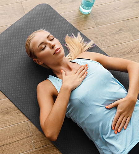 santa barbara fitness, woman lying on yoga mat