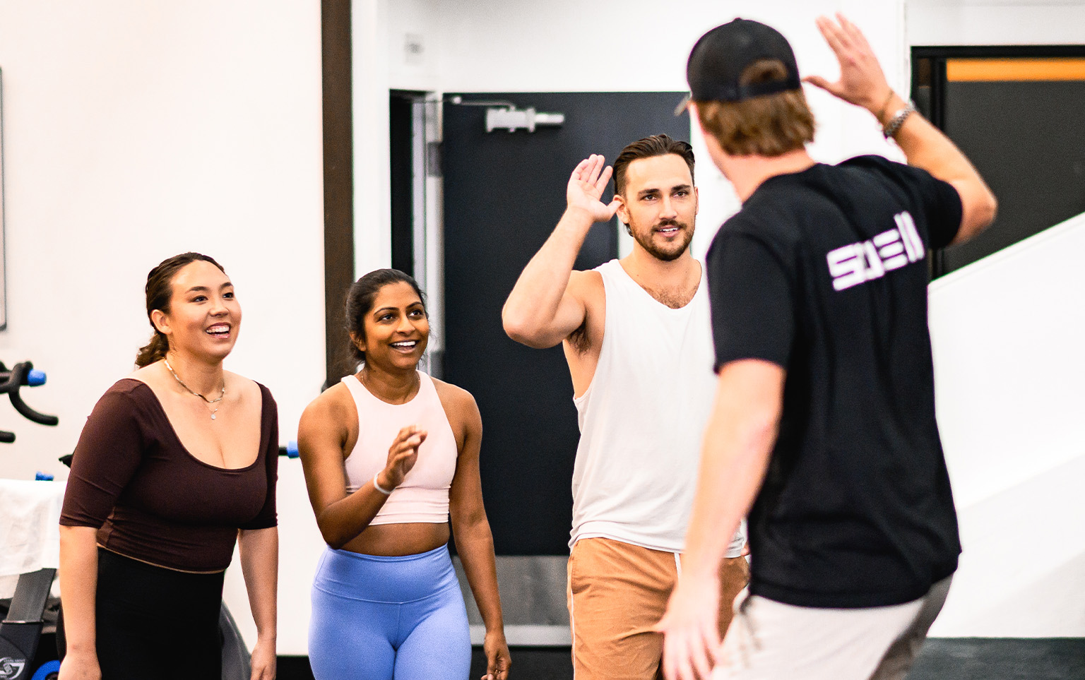 healthy mindset, Swell members high-fiving